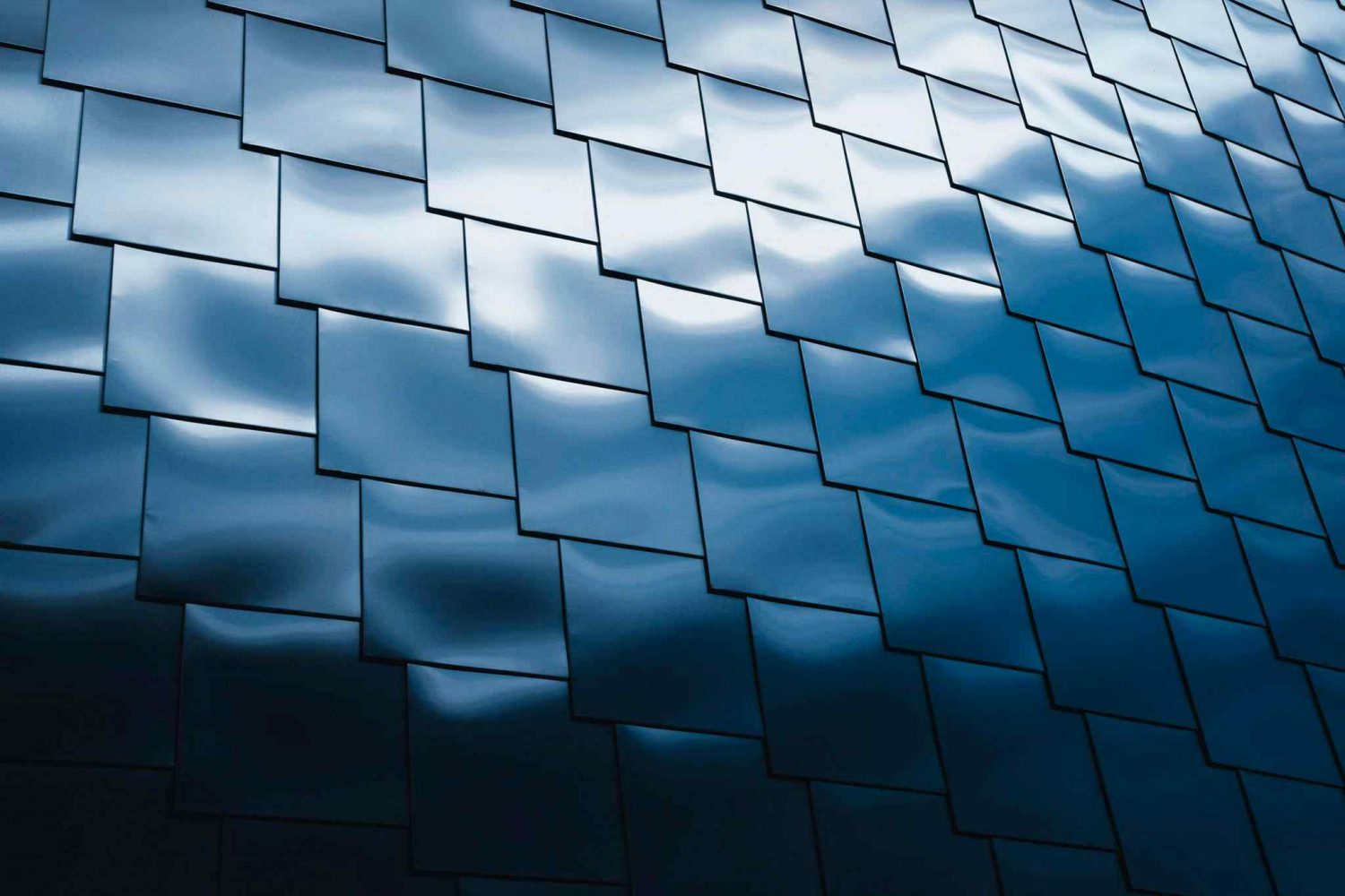 Abstract pattern of reflective blue panels, symbolizing structure and clarity in the voting process.