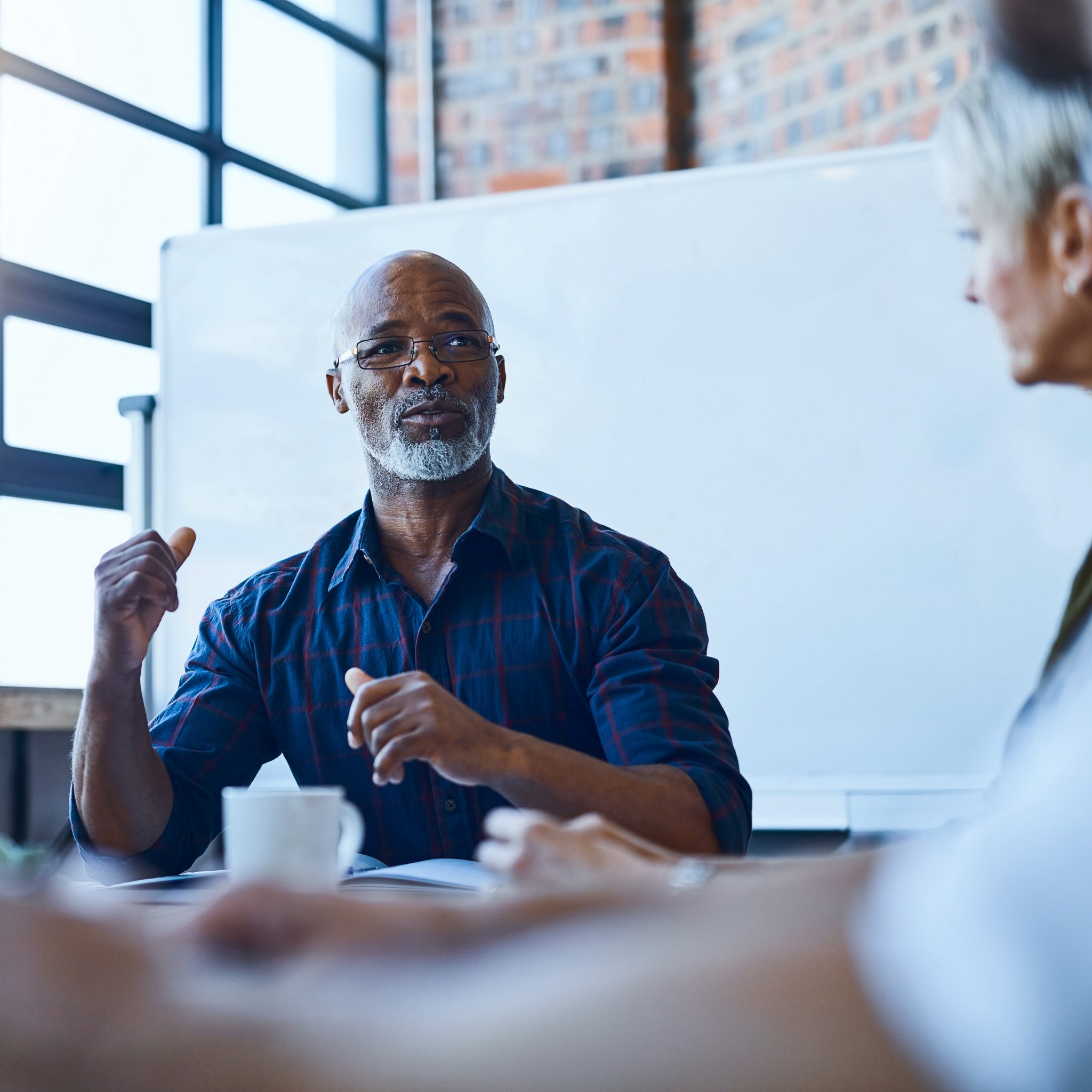 Business professionals discussing strategies related to stewardship and governance responsibilities.